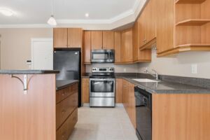 Scona Station condo for sale in Ritchie Edmonton with 500 sq ft patio.