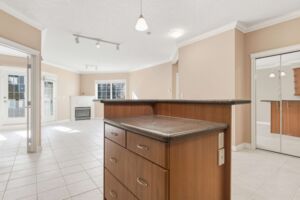 Scona Station condo for sale in Ritchie Edmonton with 500 sq ft patio.
