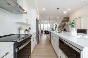 Modern living room with floor to ceiling windows and power blinds