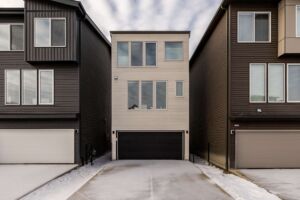 Exterior front of brand new 3-storey home in River’s Edge Edmonton