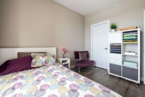 Bedroom with approved laminate flooring at The Ion Ambleside