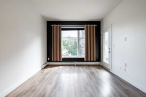 Open-concept living room at The Ion in Ambleside Edmonton